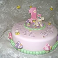 Clare Bear's First Birthday first birthday cake for our friends little girl, her pet name is clare bear so i wanted to use this as a theme for her cake. choc mud cake...