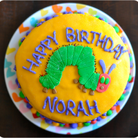 Very Hungry Caterpillar/rainbow Cake My daughter's second birthday cake. :)rainbow cake recipe from tasty kitchen. Coveredin marshmallow fondant & iced with...