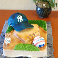 Baseball Grooms Cake Made for my cousins wedding. Hat is choc cake, plate is marble, ball is rice krispie treats, and the main cake is white frosted in...