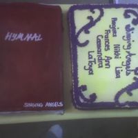 Choir Anniversary this is a hymnal and a small cake with members name. the hymnal is upside down but i dont think they noticed