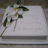 Diamond Anniversary Cake With Callas This cake was a scratch sponge cake with jam & vanilla buttercream. My first time making Calla Lillies and I'm happy with the...