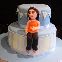 Baby Shower Cake Two tier cake for my best friend who was expecting a baby boy. Figure made from modelling paste, two tiers of chocolate fudge.Baby Harry...