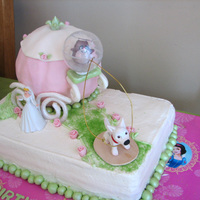 Cinderella/bolt Cake My niece wanted a Bolt and a Cinderella cake so I made Bolt pulling her carriage and the little hamster driving. Cake is buttercream except...