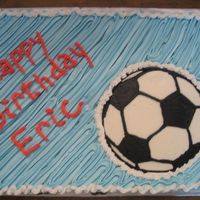 Soccer Cake Half choc/half yellow cake with buttercream and FBCT soccer ball. My cat jumped on the cake box after the cake was finished - I had to...