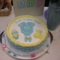 Office Baby Shower Cake I made this cake for one of my coworkers. Yellow cake, pineapple filling,almond buttercream frosting.