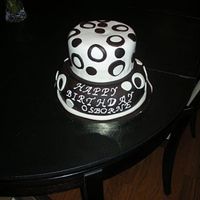 Chocolate & Vanilla Cake 12 inch chocolate cake with ganache filling and 8 inch vanilla cake with fresh strawberry filling. I got the design inspiration from many...