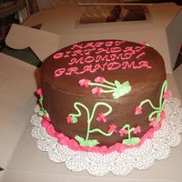 Sheila's Cake This was yellow cake with chocolate bc filling. It was my first attempt at vines and sweet peas on a cake.