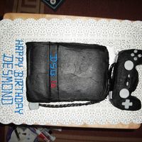First Attempt At Sony Ps2 Cake I did my best to get it smooth, but the buttercream was driving me crazy! I wanted to use fondant but I could not get it black. Chocolate...