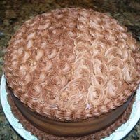 Course 2 Rosettes This cake was done in chocolate BC. Cake was chocolate fudge with chocolate mousse filling. (VERY rich)