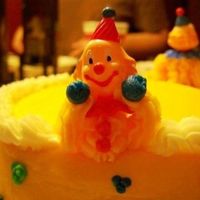 Course 1 Clown Cake This cake was done in my Course 1 class. This clown was placed on his belly, with hands supporting face.