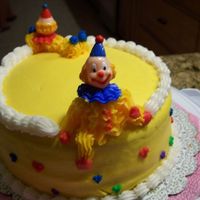 Course 1 Clown Cake This clown's leg was propped up on the top of the cake.