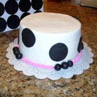 Paula's Graduation Cake is strawberry, cream cheese filling, bc icing with fondant accents.