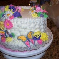 Course 2 Finale Cake This is my course 2 grand finale cake. Instead of bluebirds, I chose to use butterflies and dragonflies in color flow.