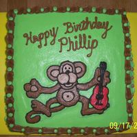 Guitar Monkey Cake Made for my brother who plays guitar and collects monkeys