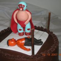 Nacho Libre Chocolate fudge cake, cream cheese & oreo filling, covered with (Chef Taz's recipe) ganache. First attempt at making figures with...