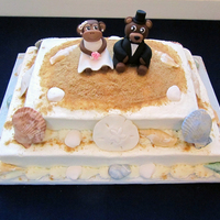 Monkey & Bear Beach Cake Red velvet beach themed groom's cake with gumpaste sea shells, fondant/gumpaste monkey bride and bear groom, and graham cracker "...