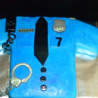 Police Birthday Cake This cake was for a customer who's Dad is a cop. Yellow cake with chocolate buttercream filling. This cake was a blast to make. Thanks...