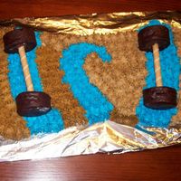 Skateboard Cake. My first cake. Made for my son's 6th birthday. I had never colored frosing or carved a cake before. He loved it! It was the start of...