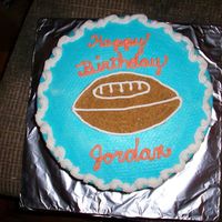 Football Birthday Cake This was for a friend's grandboy. She loved it and I got paid for it. YEA!!!!!!2 layer yellow cake with buttercream.