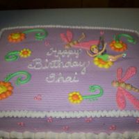 Tinkerbelle Cake They wanted a cake with Tink and dragonfies. I thought it turned out okay. I wish I had time to do the dragonflies out of fondant. It is...