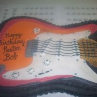 Pastor Bob's Guitar This was for my pastor's birthday. I tried to replicate his guitar he plays in church. I done the best I could. Almond cake with...