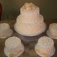 Quinceanera Cake White cake, whipped icing, ivory color and fondant bows