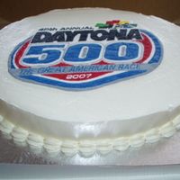 Daytona 500 Nascar Cake White Almond Sour Cream cake, IMBC, and cheesecake flavoured pudding with blackberries for the filling. Logo is done in FBCT. The best...