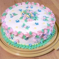 Flower Cake Last cake made in the Wilton Class. My mom and me took the class together and teamed up to make this one.