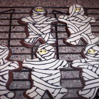 Mummy Cookies I loved these cookies when someone elae posted them. they were sooo cute. Anyway, my version is chocolate rolled cookies, some with antonia...