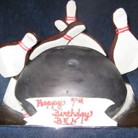Bowling Strike! For a little boys birthday... Chocolate cake with BC and covered in MMF, pins are rolled chocolate cookies with mmf and bc accents. I just...