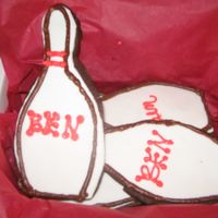 Bowling Pin Cookies to go with the bowling cake. THese are chocolate rolled cookies with mmf and bc accents.