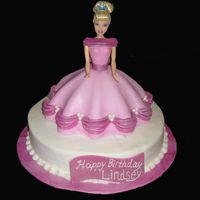 Pink Barbie This cake was a blast to make! She is covered in MMF and the round is BC. My inspiration was from mjs4492. Thanks for looking.