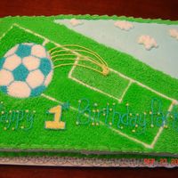 Soccer Birthday Birthday cake for my 1-year old nephew. The family is very involved with soccer but wanted it to look like it was for a little boy (blue...