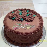 Chocolate Cake With Roses This was a chocolate cake with chocolate buttercream. I made this cake for my brother's birthday.