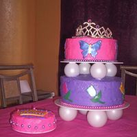 1St Birthday Princess Cake I made these cakes for my daughter's 1st birthday. A friend of mine made the little MM fondant pearls, but the rest was my handyn work...