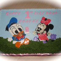 Baby Mini And Donald This is a piping gel transfer. I then filled in Mini and Donald with cookie icing.