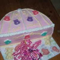 Baby Shower Umbrella With Care Bears I was asked to make a cake for a baby shower, my first shower cake ever! Mom-to-be is expecting a girl, and wants everything pink and white...