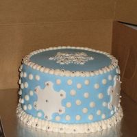 Winter Wonderland For my DH's office Chrismas party. Chocolate cake and mint SMBC. Covered in fondant and crusting BC accents.