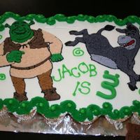 Shrek My first cupcake cake and my first attempt at doing characters on a cake. Overall pretty pleased with it and my friend's little boy...