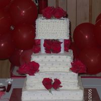 4 Tiered Cake This was my second attempt at a wedding cake. The first one I ever did actually came out better and i will post it soon. This cake looked...