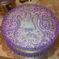 Hannah Montana Guitar Cake This was my daughter's 7th birthday cake. It is Betty Crocker Gluten Free cake mix (it took FOUR booxes!) - the top is Frozen...