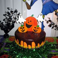Spooky Cake I made this for my daughters' Halloween party - it is a devils food cake with buttercream and chocolate glaze. The large pumpkin is a...