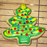 Christmas Tree Cookies These are my first fancy decorated cookies! I used royal icing - thick for outlining and thinned for flooding. I piped on the details at a...