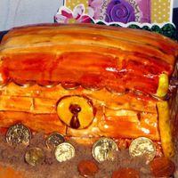 Treasure Box Fondant Cake This is one of 2 cakes for my daughter's princess and pirate birthday. This was my first time using fondant and it was a little tricky...
