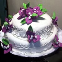 Bougainvillea Dream&acirc;&acute;s The flowers maked in gumpaste and the fine lace in gumpaste, rest of cake in american Paste and Glace.