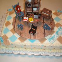 Yard Sale This was a cake that wasmade for a man turning 80. He loves yard sales. He likes to buy broken things and fix them up. I made a yard sale...