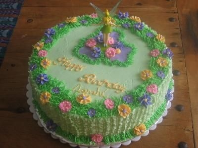 Tinkerbell Cake BC vanilla cake,it was for a girl in my daughter's school,i enjoyed making this cake!! thanks for watch
