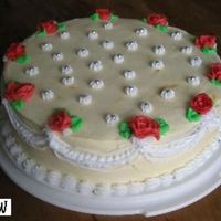 Roses Cake I made this cake for a dinner,white chocolate whip cream,roses in buttercream,vanilla cake,filling with bavarian cream and fresh...