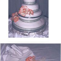 Sherels_Wedding_Cake_July_9Th.jpg This is a wedding cake I did for my cousin , she got married July 9th 2005, one problem I had with this cake was I think the cake was too...