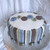 Striped Shower Cake 3rd attempt at a fondant cake. 1st time at putting fondant stripes on the side and getting them fairly straight:) sides are ripply as i...